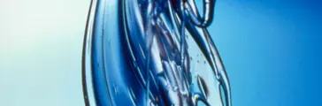 Flowing LSR (liquid silicone rubber). Copy Neg taken from display booth also in file.....