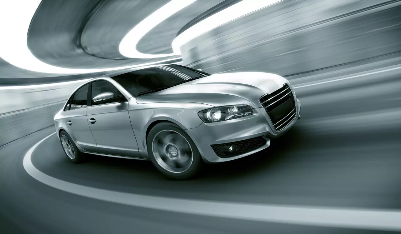 Silver car in tunnel
