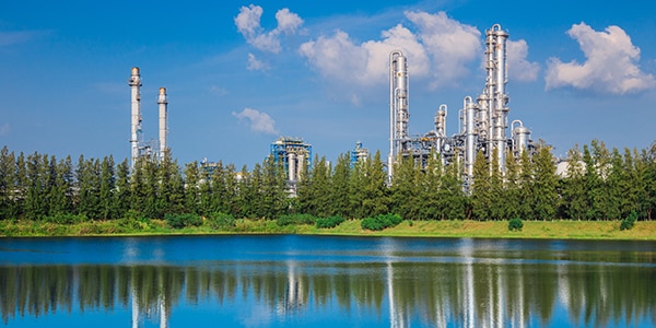 Factory by water
